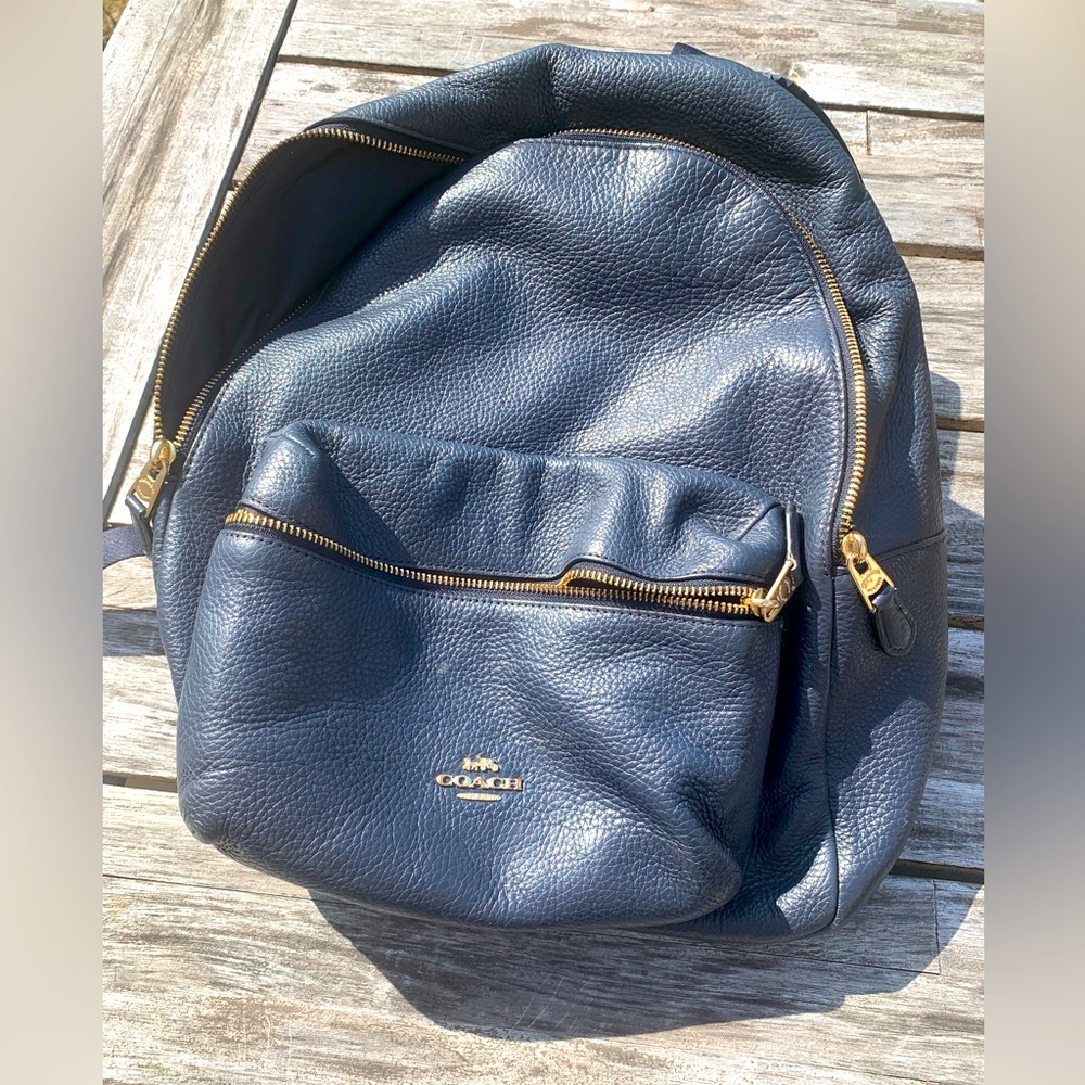 Coach Woman’s Court Backpack (navy blue and pebble leather 13”